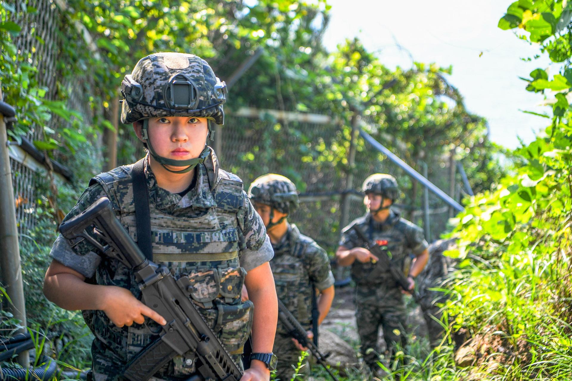 Female Marine stands guard on Korea's front-line island